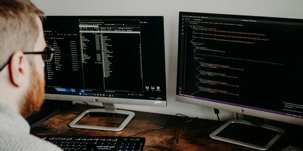 A man coding to solve tehnical seo problems in a automated way